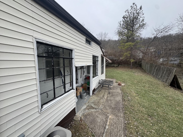 view of yard with central AC unit