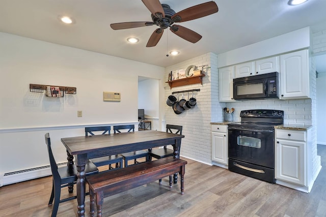 kitchen featuring white cabinetry, ceiling fan, light stone countertops, light hardwood / wood-style floors, and black appliances