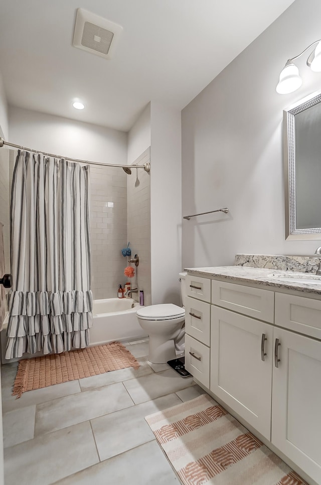 full bathroom featuring vanity, toilet, and shower / bath combo