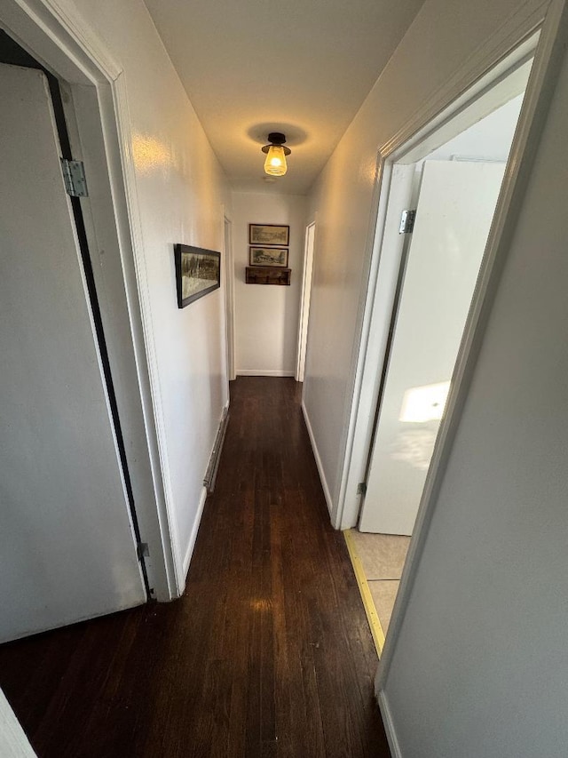 hall featuring dark hardwood / wood-style floors