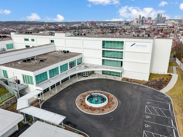 view of building exterior featuring a city view