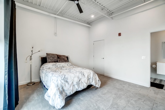 bedroom featuring a ceiling fan and baseboards