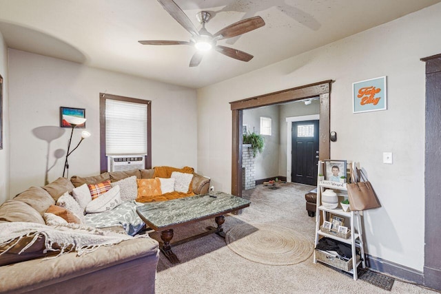 carpeted living room featuring cooling unit and ceiling fan