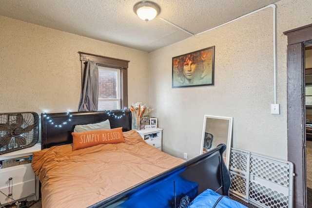 bedroom featuring a textured ceiling