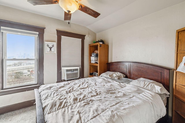 carpeted bedroom with lofted ceiling, cooling unit, and ceiling fan