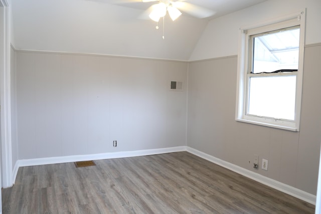 bonus room with hardwood / wood-style flooring, vaulted ceiling, and ceiling fan