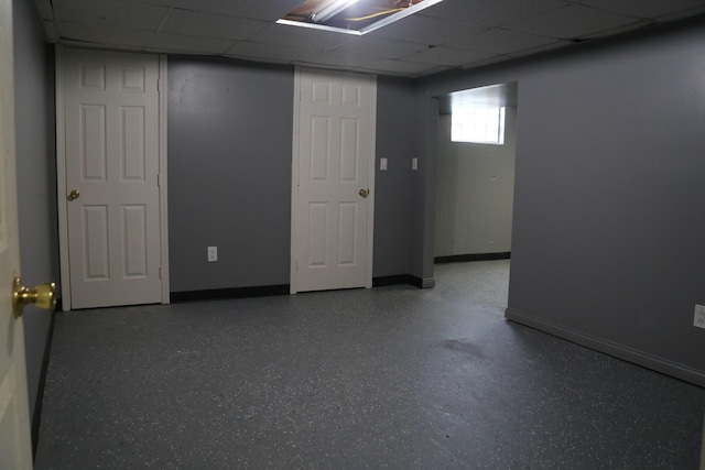 spare room with a paneled ceiling