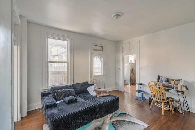 living room with dark wood-type flooring