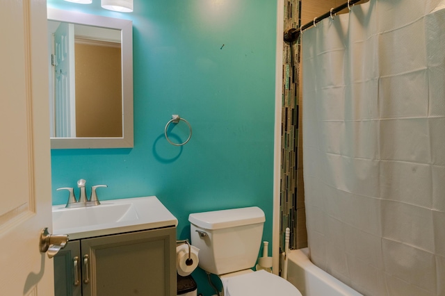 full bathroom with vanity, toilet, and shower / bath combo with shower curtain