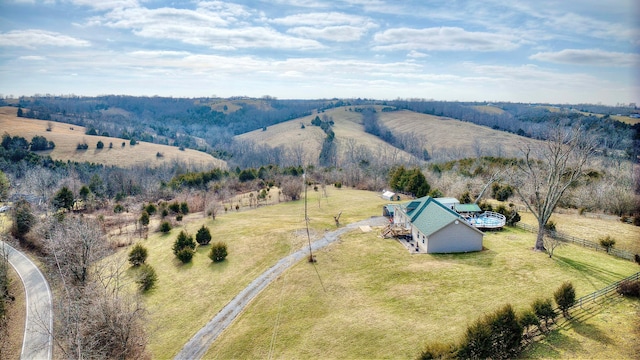 drone / aerial view featuring a rural view and a mountain view