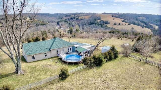 birds eye view of property featuring a rural view