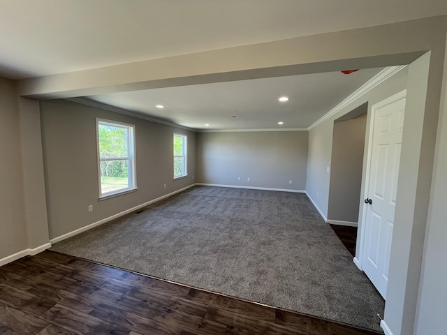 1703 Barons Cv, Hebron, KY 41048 - unfurnished room with ornamental molding, baseboards, recessed lighting, dark wood-style flooring, and dark colored carpet