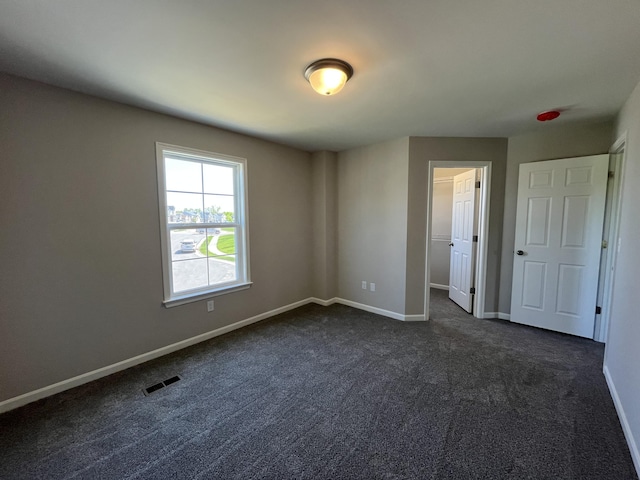 1703 Barons Cv, Hebron, KY 41048 - empty room with dark carpet and baseboards