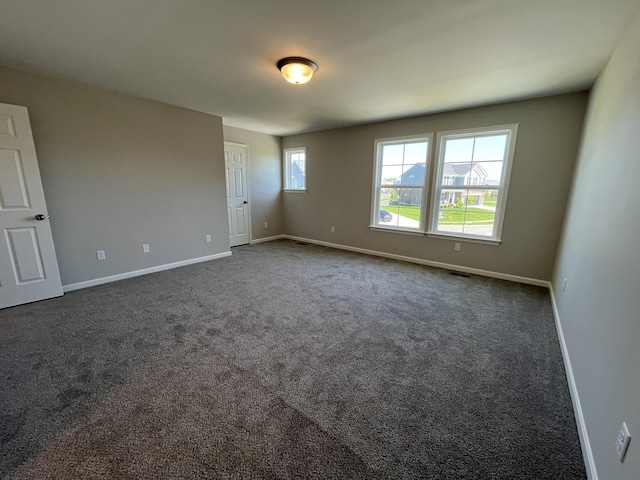 1703 Barons Cv, Hebron, KY 41048 - empty room with baseboards and dark carpet