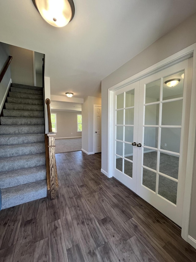 1703 Barons Cv, Hebron, KY 41048 - staircase featuring french doors, wood finished floors, and baseboards