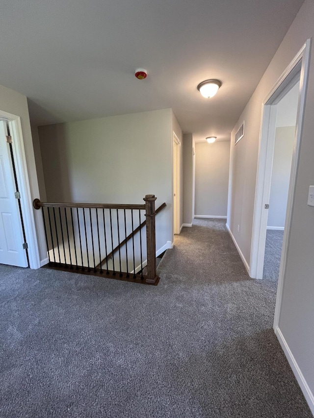 1703 Barons Cv, Hebron, KY 41048 - corridor featuring an upstairs landing, carpet floors, and baseboards