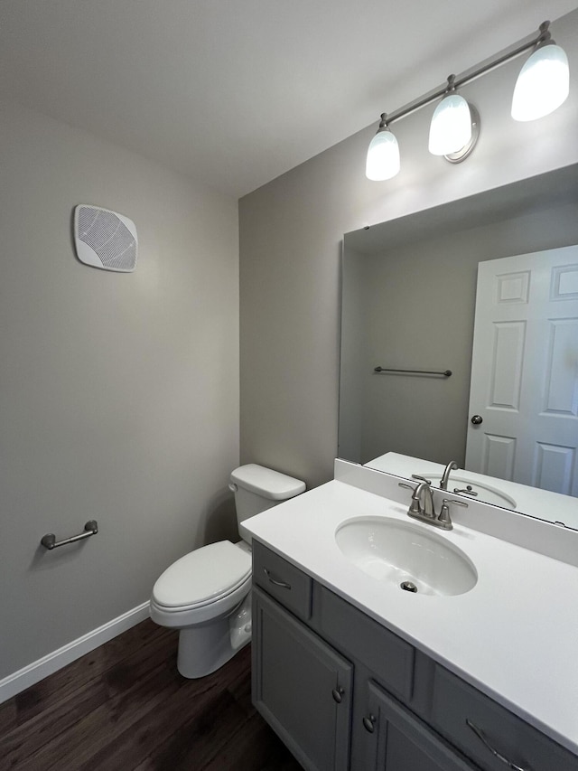 1703 Barons Cv, Hebron, KY 41048 - bathroom with toilet, wood finished floors, baseboards, and vanity