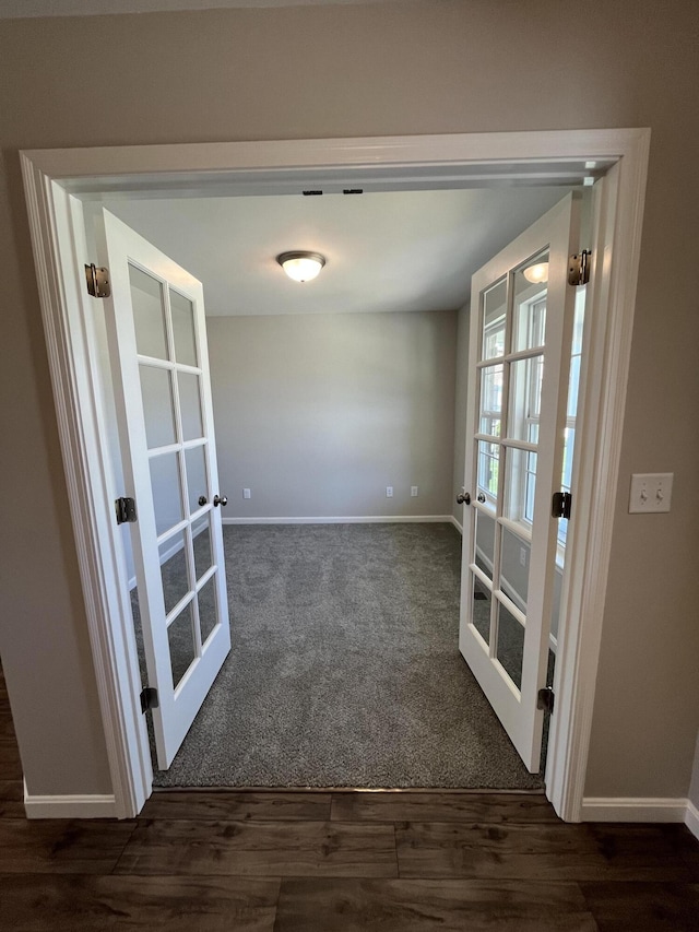 1703 Barons Cv, Hebron, KY 41048 - unfurnished dining area featuring french doors, baseboards, and wood finished floors