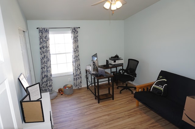 office space with ceiling fan and light hardwood / wood-style floors