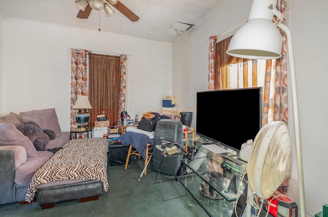 carpeted living room featuring ceiling fan