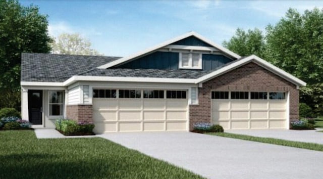 view of front of house featuring a garage and a front lawn