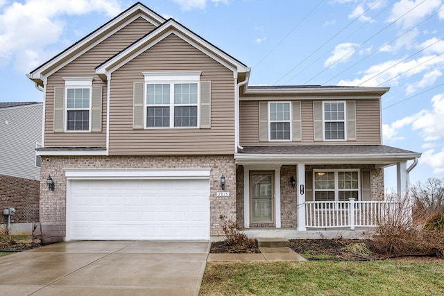 view of front of home featuring a garage and covered porch