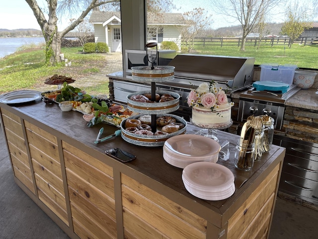 view of patio with an outdoor kitchen