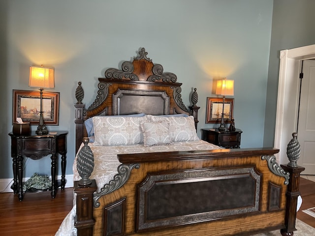 bedroom featuring dark wood-type flooring