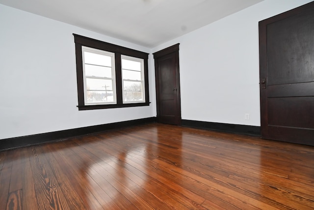 unfurnished room featuring hardwood / wood-style floors