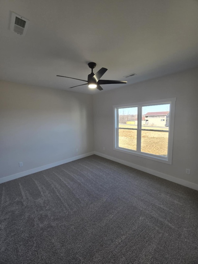 carpeted empty room with ceiling fan