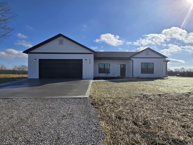 single story home featuring a garage