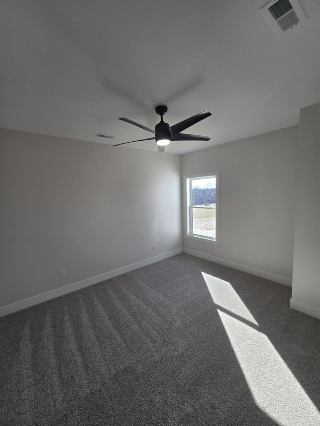 carpeted empty room with ceiling fan