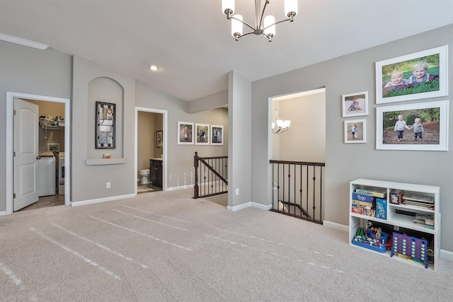 interior space with lofted ceiling, light colored carpet, and a notable chandelier