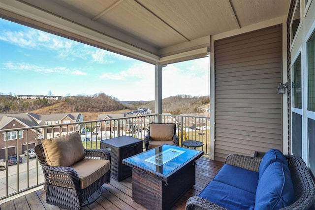 deck with an outdoor hangout area