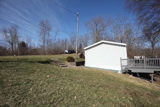 view of yard featuring a wooden deck