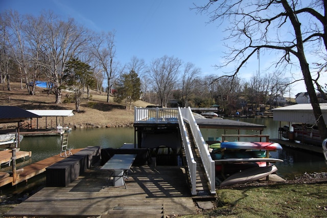 view of dock with a water view and boat lift