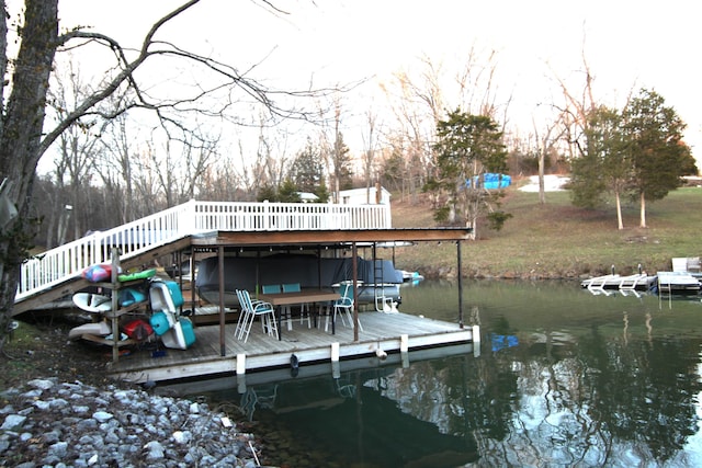 dock area with a water view