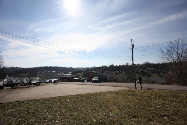 view of yard with a water view