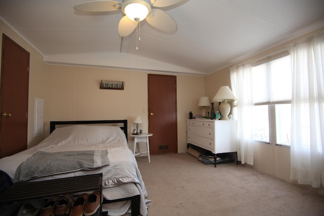 bedroom featuring carpet floors, a ceiling fan, and lofted ceiling