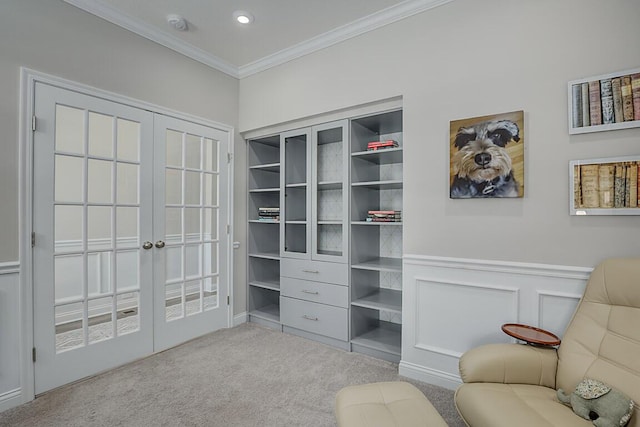 spacious closet featuring french doors and light colored carpet