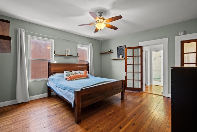 bedroom featuring wood-type flooring and ceiling fan