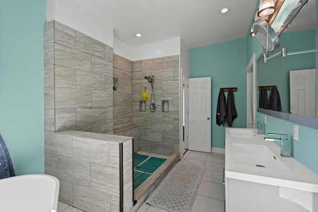 bathroom featuring vanity and shower with separate bathtub