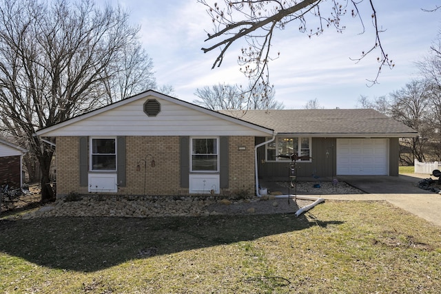 view of front of home featuring a garage and a front yard