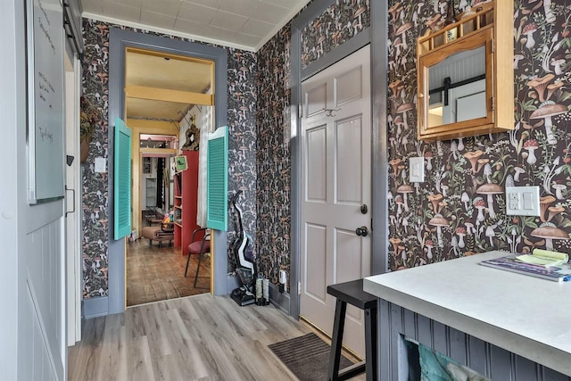 entryway with light hardwood / wood-style floors