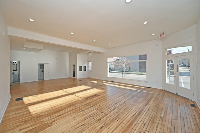 interior space featuring light hardwood / wood-style floors and french doors