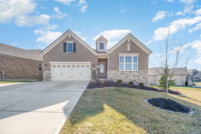 view of front of home with a garage and a front yard