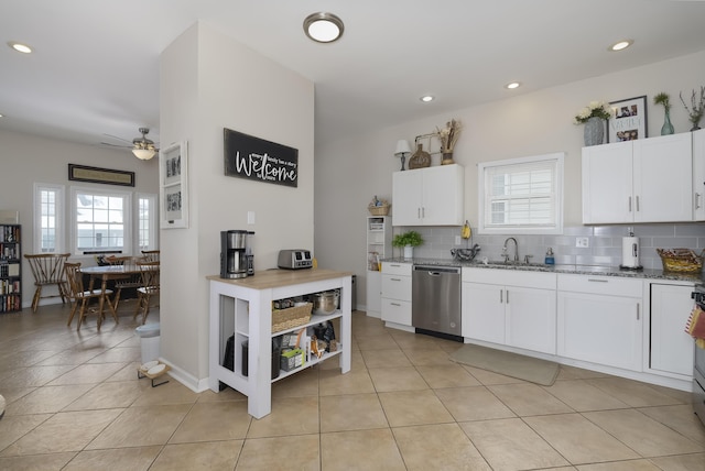3408 Cowie Ave, Erlanger, KY 41018 - kitchen featuring sink, backsplash, white cabinets, stone countertops, and stainless steel dishwasher