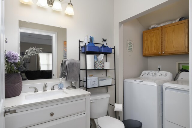 3408 Cowie Ave, Erlanger, KY 41018 - bathroom with vanity, independent washer and dryer, and toilet