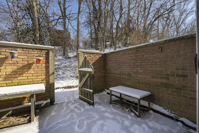 view of snow covered patio