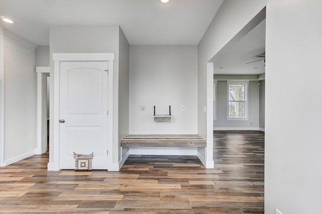 interior space with recessed lighting, baseboards, and wood finished floors